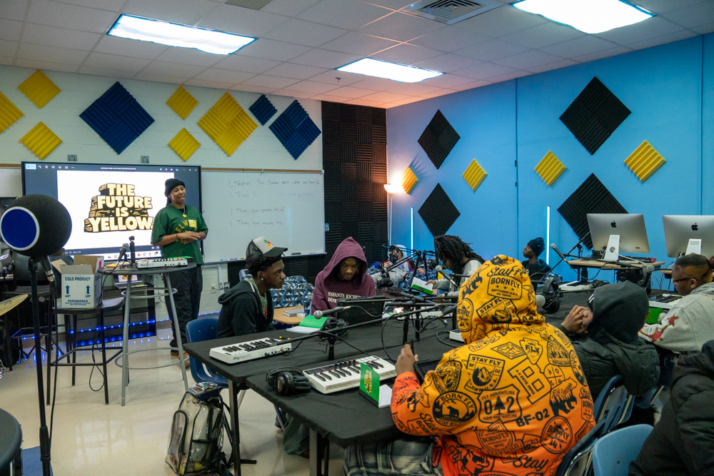 Students at keyboards and microphones during the Mays workshop