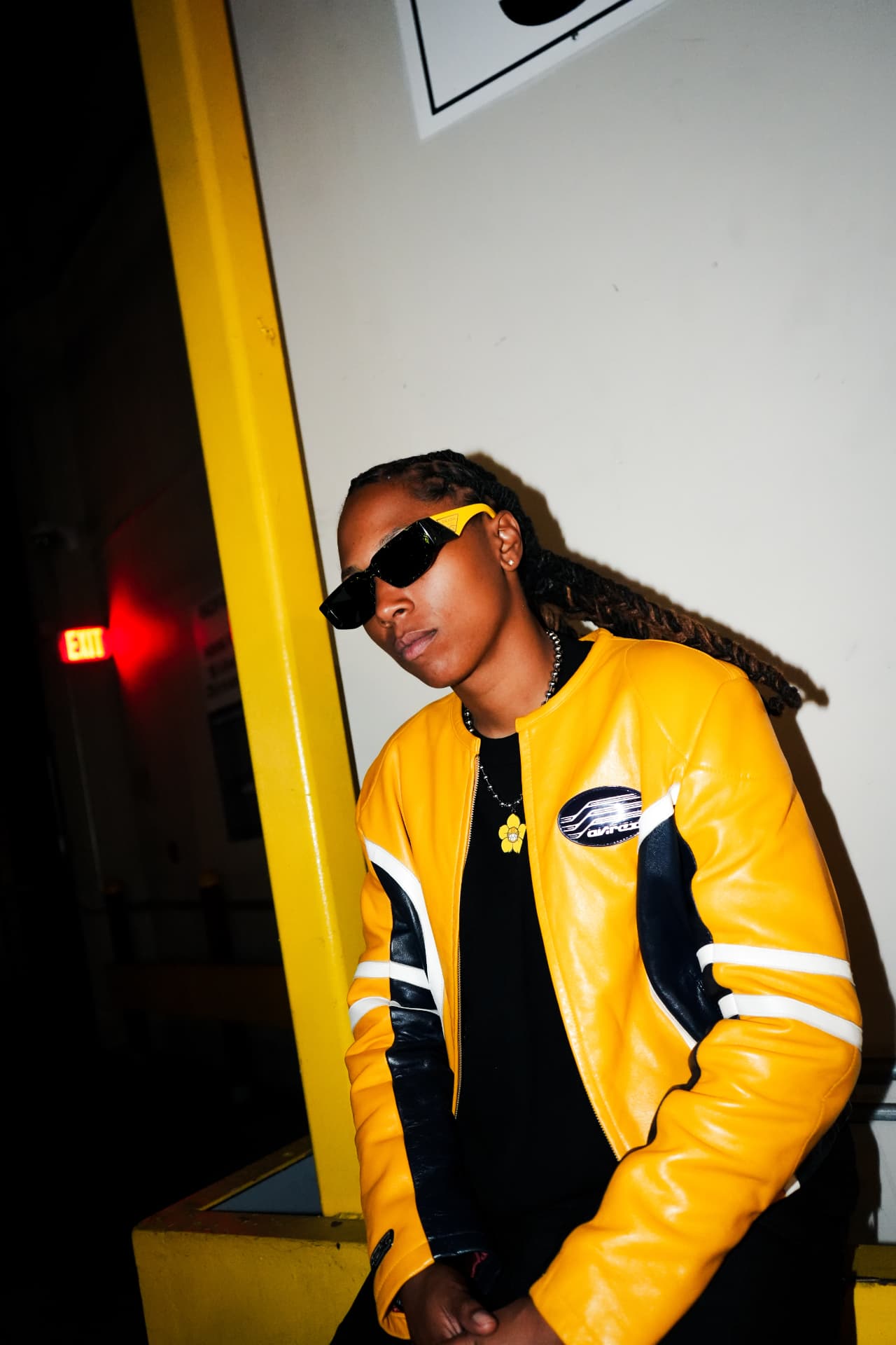 Suni MF in a yellow leather jacket